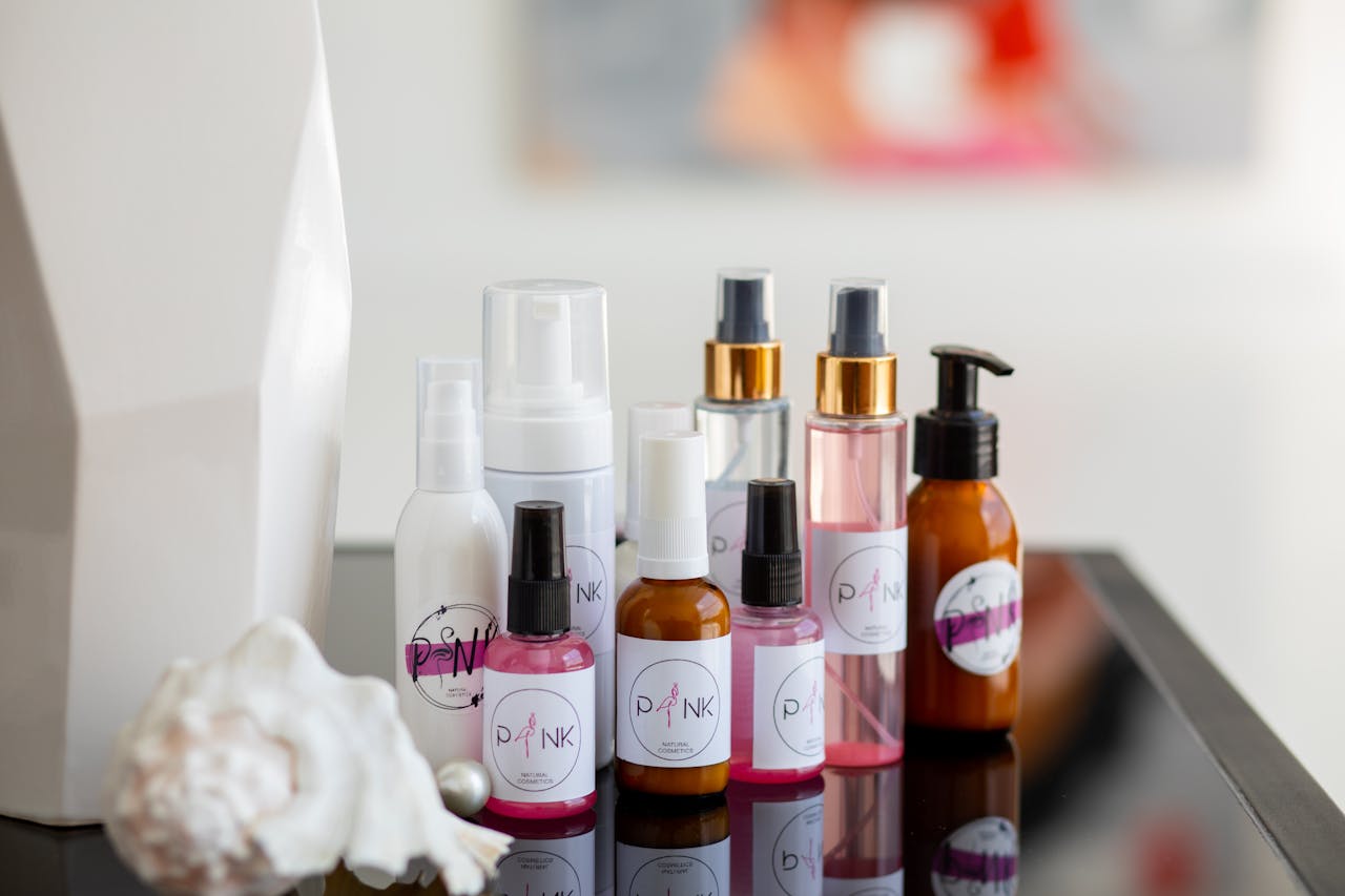 Mastering the First Impression: Your intriguing post title goes here Collection of diverse skincare bottles arranged stylishly on a reflective surface, ideal for beauty concepts.